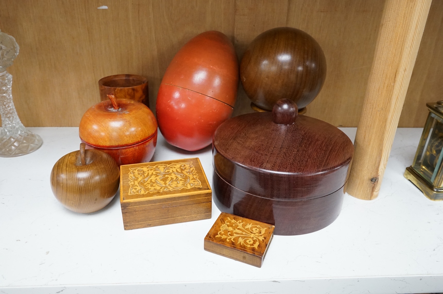 A small collection of treen to include a box in the form of an apple and an inlaid matchbox, largest 18cm high